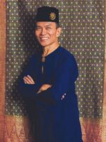 GLAM Profil, John Ang 04